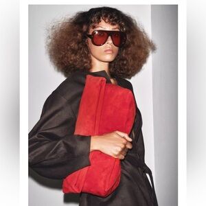 LIMITED EDITION MAXI SUEDE CLUTCH